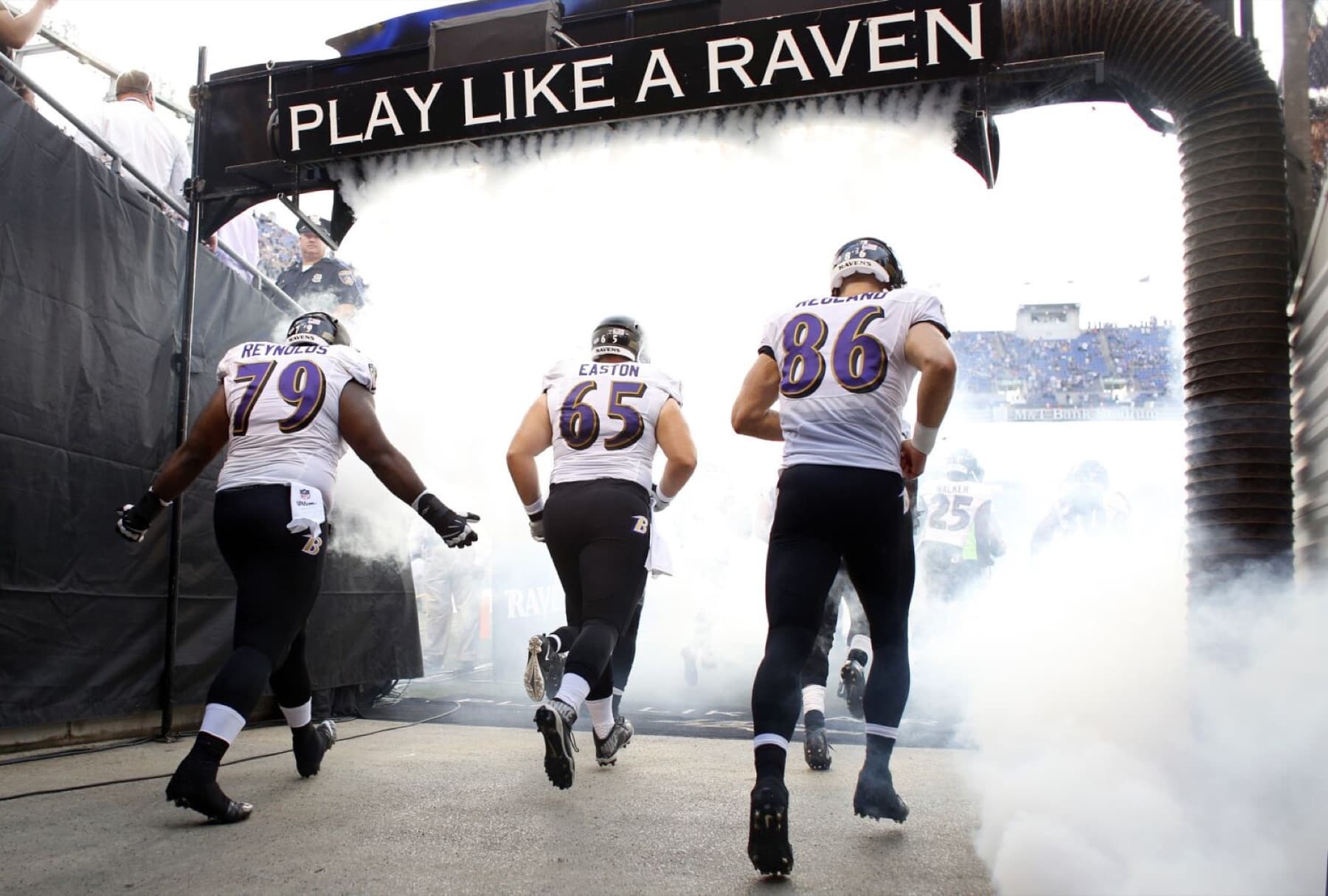 Caj Reynolds entering the stadium tunnel with the Baltimore Ravens
