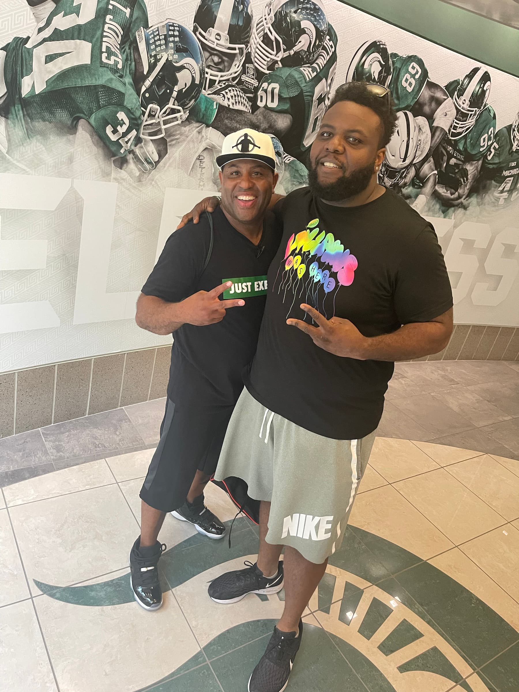 Caj Reynolds with Eric Thomas and community leaders