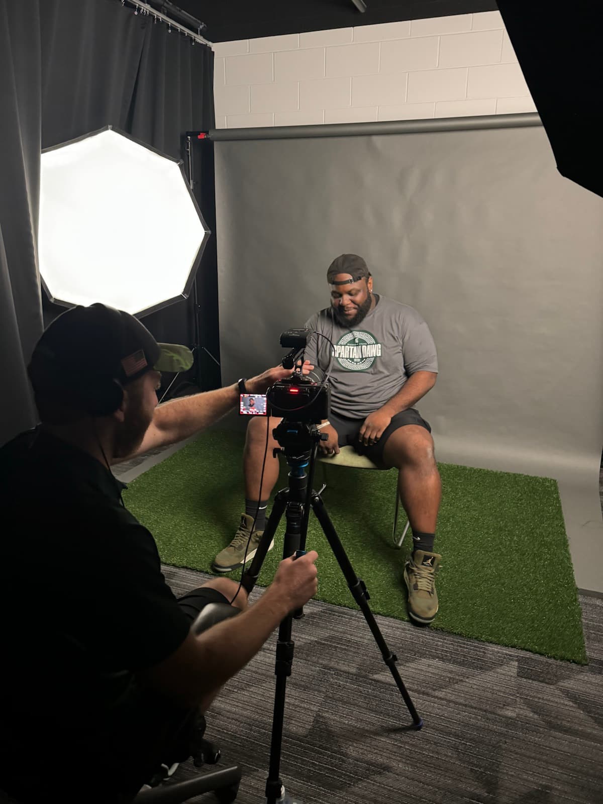Caj Reynolds being filmed during an MSU interview