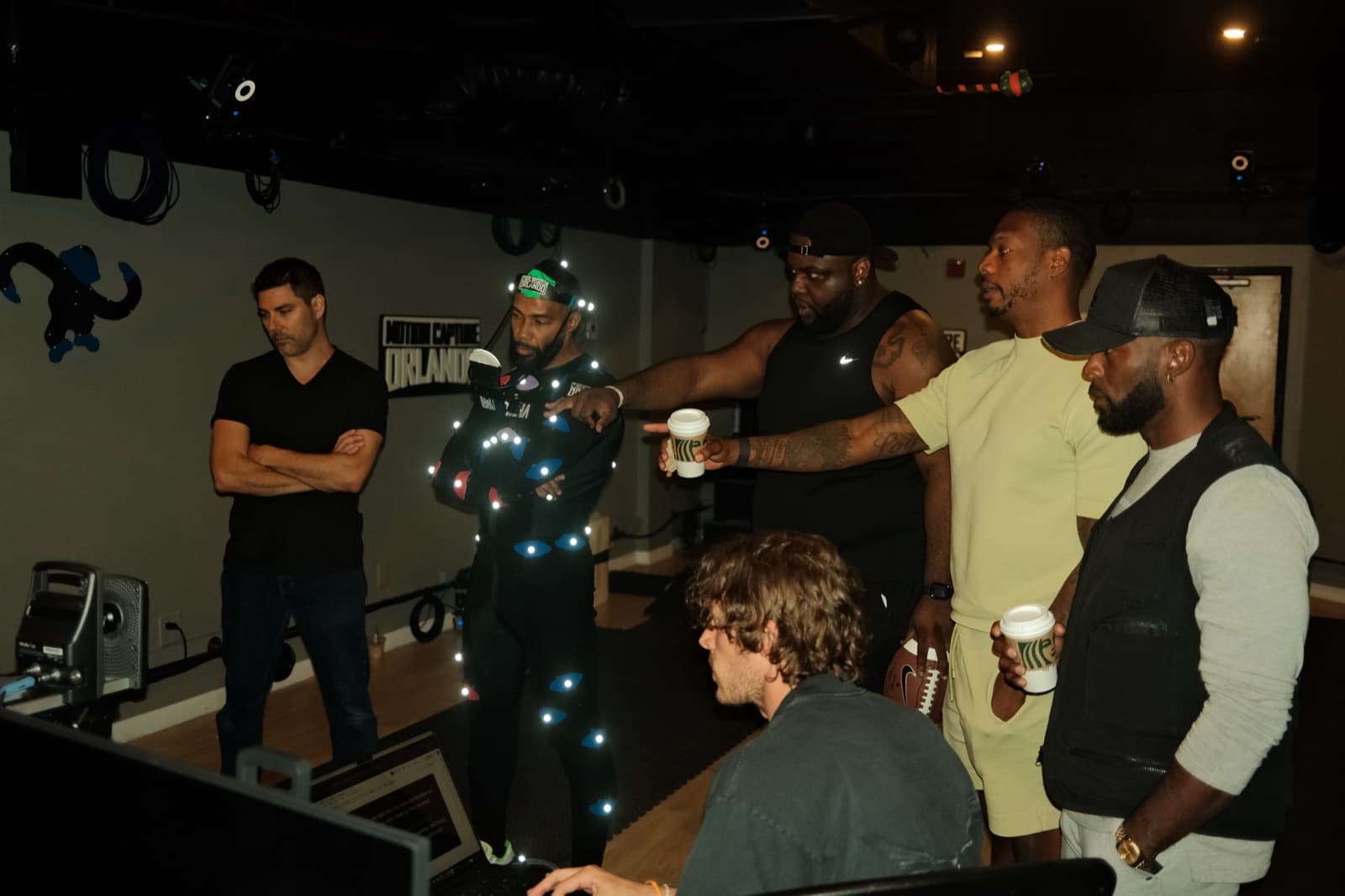 Caj Reynolds directing a performance during an NFL Pro Era motion-capture shoot