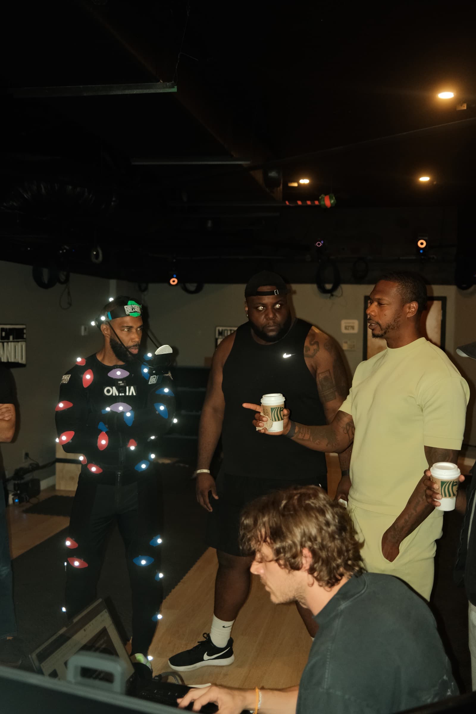 Caj Reynolds on set with Omari Hardwick and collaborators